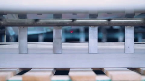 Close up, Automatic line for printing and cutting in the printing house. Stock Footage 197463716