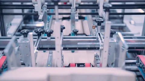 Close up, Automatic line for printing and cutting in the printing house. Stock Footage 197463719