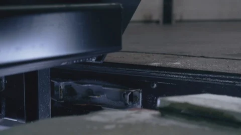 Close-up Automatic loading platform lowered in the logistics center Video stock 104250922