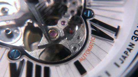 Close-up of automatic mechanical watch movement ticking Stock Footage 102546094