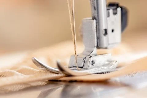 Close-up Automatic sewing machine with fabric and thread Stock Photos