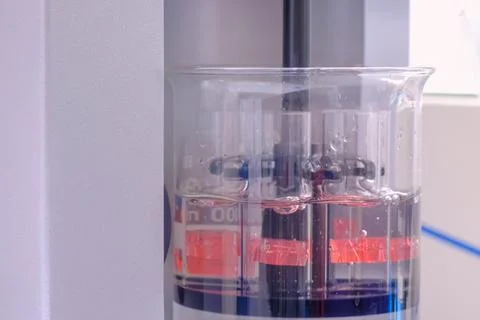 Close up: automatic tablet disintegration tester - laboratory equipment concept Stock Photos