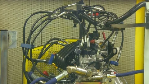 Close up of automatic testing engine of car on an automobile plant Video stock 152312335