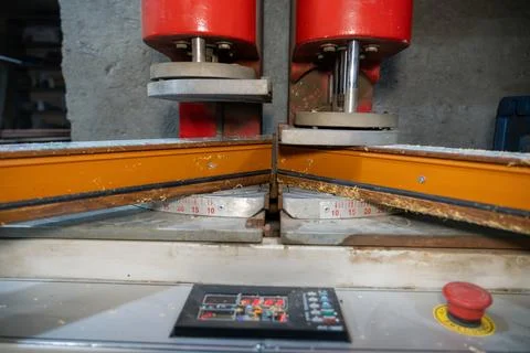 Close up of automatic welding machine for plastic window frames. Stock Photos