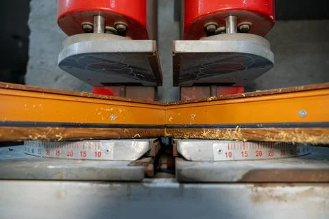 Close up of automatic welding machine for plastic window frames. Stock Photos