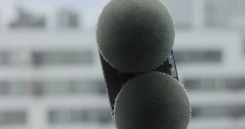 Close up automatic window cleaning robot operating on residential window Видео 320073374