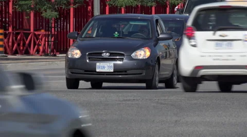 Close-Up of Automobile traffic through an Intersection Stock Footage 41243201