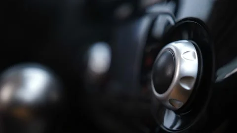 Close-up. Automotive control panel, female hand spinning roller 4K Slow Mo Video stock 100397802