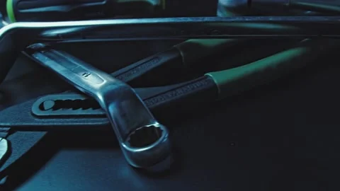Close up automotive mechanic picking tools in garage Stock Footage 155798802