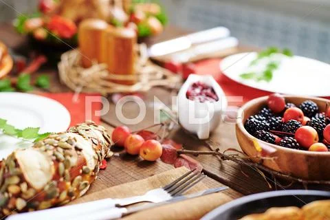 Close-up of autumn berries on table at thanksgiving dinner Stock Photos