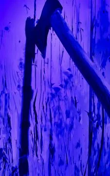 Close up of an axe head resting against a textured wooden surface with blue.. Stock Photos