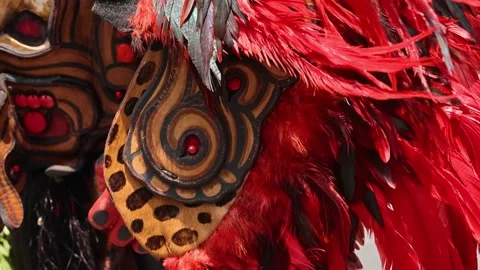 Close Up Of Aztec Jaguar Warrior Costume With Carved Mask Feathers Skulls Video stock 344627283