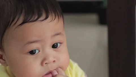 Close-up of baby boy with blur background Stock Footage 224431545