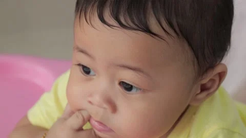 Close-up of baby boy with blur background Video stock 224431564