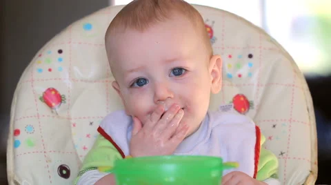 Close up of Baby eating Stock Footage 46517671