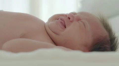 Close up baby waking up crying Stock Footage 263639068
