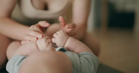 Close-up of Babys Tiny Hands During Playtime Stock Footage 317783458