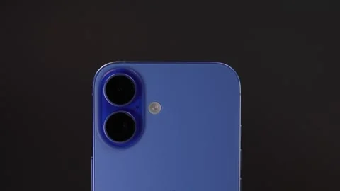 Close-up of the back cover of the Iphone 16 phone Stock Footage 304241579