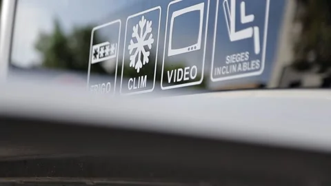 Close-up of the back of the passenger bus with stickers  Stock Footage 223033536