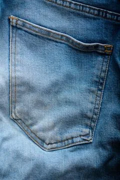 Close-up of the back pocket of an old pair of jeans. 스톡 사진