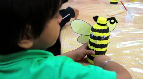 CLOSE UP-BACK SHOULDER. Boy doing activities in the kindergarten. Stock Footage 48433100