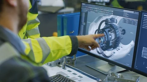 Close-up Back View of the Mechanical Engineer Designing 3D Engine Model on PC Stock Footage 93687072