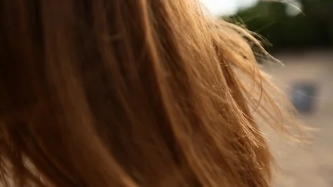 Close back view of red woman hair tender movement in the air in slow motion Stock Footage 88410086