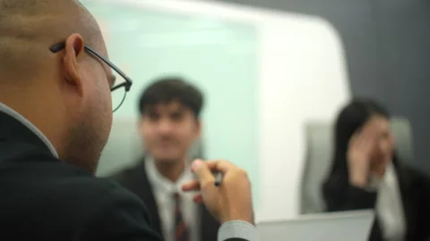 Close-up back view of stressed leader business man holding his head while. Stock Footage 278215711