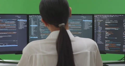Close Up Of Back View Tired Asian Woman Developer Stretching While Write Code Stock Footage 231129454