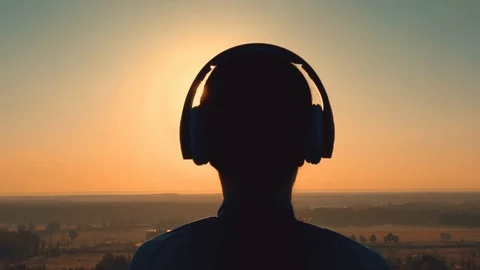 Close up back view of woman head headphones Stock Footage 120740941