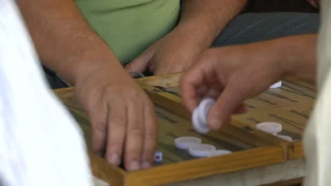 Close Up Of Backgammon Board And Jewish Men Exchange Money And Roll Dice Again Video stock 238647150