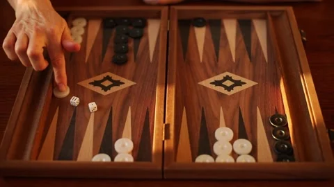 Close Up of Backgammon Board with Dice and Checkers Stock Footage 332639924