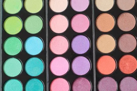 Close up. the background image is large set of eye shadow Stock Photos