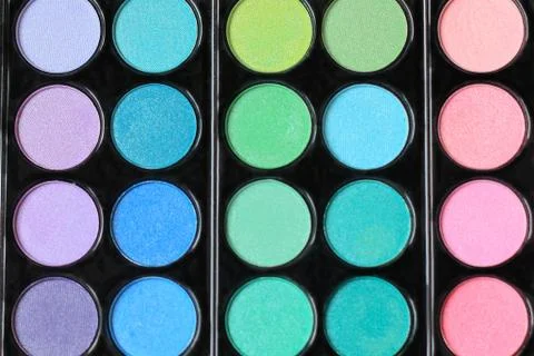 Close up. the background image is large set of eye shadow Stock Photos