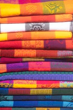 Close-up as background of multi-colored blankets Fotos de archivo