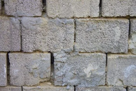 Close up background of old, gray brick wall. Stock Photos