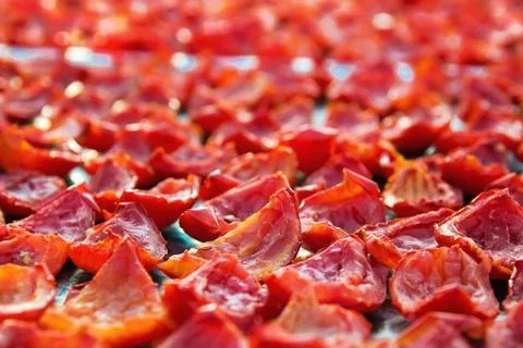 Close-up Background of Red Tomatoes Drying outdoors on a  sunny day Stock Photos