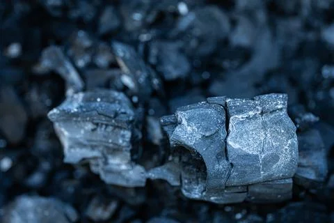 Close up background texture of black charcoal pieces Stock Photos