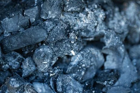 Close up background texture of black charcoal pieces Stock Photos
