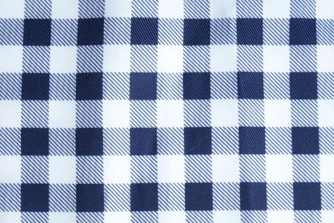 Close the background texture of the cotton tablecloth. Black and white squares. Stock Photos