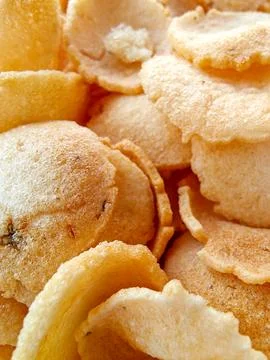 Close up background texture of crispy golden brown traditional crackers or chips Stock Photos