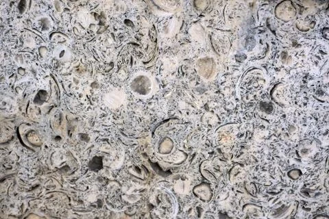 Close up background texture of cutting layers of weathered granite cliff eros Stock Photos