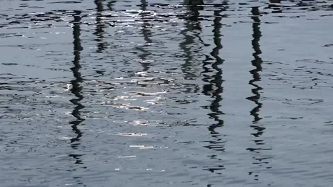 Close-up background with wavy dark water Stock Footage 238664027