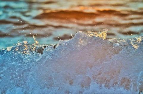 Close up of backlit breaking wave Stock Photos