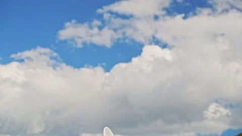 Close-up of a badminton racket hitting a shuttlecock against a background of Stock Footage 213329927
