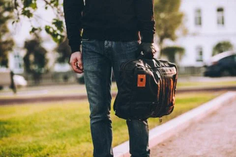 Close-up of bag being held by gloved hand of robber Stock Photos