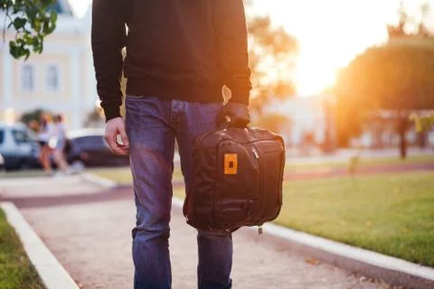 Close-up of bag being held by gloved hand of robber Stock Photos