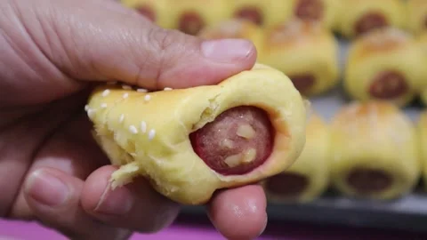Close up of an baked hotdog bread rolls Stock Footage 328013333