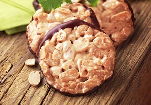 Close-up of baked nut-filled date pastries Stock Photos