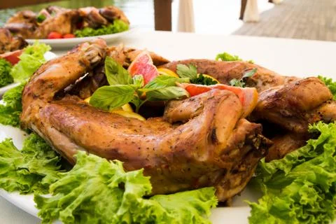 Close-up of baked rabbit with fruit Stock Photos